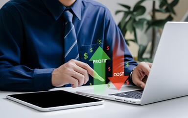 A businessman analyzing financial data with a laptop and tablet, illustrating profit and cost trends