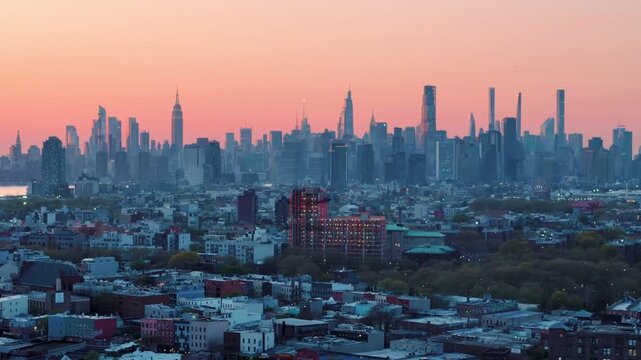 Aerial landscape of Manhattan skyline from Williamsburg Brooklyn at sunset in New York City NY