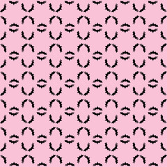 Halloween seamless pattern Bats and white polka dots on pink background spooky spirit autumn holiday Vector illustration