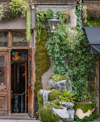 entrance to the old house with flowers