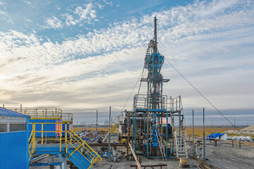 The Northern gas field. Summer. Installation for lowering a flexible pipe into a well. Equipment...