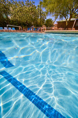 Underwater Pool View Sunlit Water and Neighborhood Trees in Las Vegas
