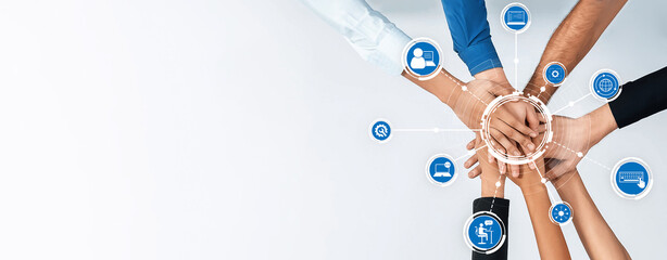 A powerful visual depicting diverse hands joining together, representing teamwork and collaboration...