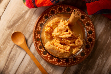 Chongos Zamoranos. A Mexican dessert made from curdled milk prepared with syrup and cinnamon, it...