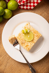 Carlota de Limon, a cold, no-bake dessert made with layers of Maria cookies and a creamy mixture of lemon and condensed milk, an easy homemade recipe very popular in Mexico.