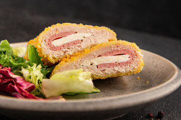 Cordon bleu cutlet meat dish French cuisine vegetable dish natural product tasty snack fresh delicious gourmet food background on the table rustic top view copy space