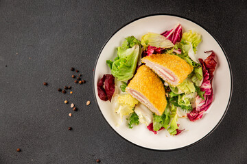 Cordon bleu cutlet meat dish French cuisine vegetable dish natural product tasty snack fresh delicious gourmet food background on the table rustic top view copy space