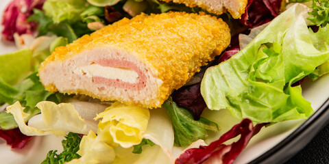 Cordon bleu cutlet meat dish French cuisine vegetable dish natural product tasty snack fresh delicious gourmet food background on the table rustic top view copy space