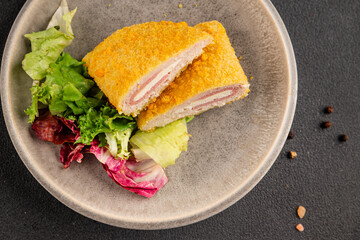 Cordon bleu cutlet meat dish French cuisine vegetable dish natural product tasty snack fresh delicious gourmet food background on the table rustic top view copy space