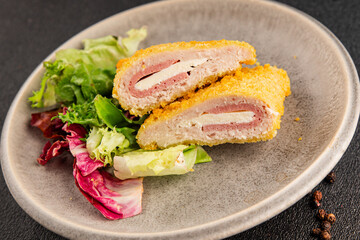 Cordon bleu cutlet meat dish French cuisine vegetable dish natural product tasty snack fresh delicious gourmet food background on the table rustic top view copy space