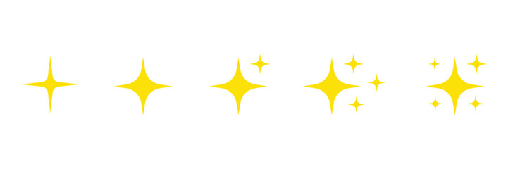 Collection of bright yellow starbursts and sparkles with a glowing effect isolated on transparent background