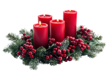 Festive Christmas centerpiece featuring red candles and greenery for holiday decoration and celebration in a cozy home setting