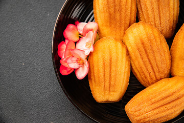 Madeleine cookies sweet dessert traditional french sweets tasty snack fresh delicious gourmet food background on the table rustic top view copy space