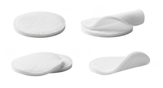 Four white foam makeup sponges isolated on transparent background with various shapes and textures