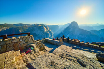 Half Dome and Glacier Point Sunrise View with Sunbeam and Visitors in Yosemite