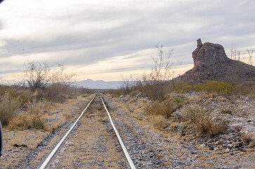 Discover the rugged beauty of the desert landscape with a rocky mountain, perfect for adventure travel or nature photography projects in the American Southwest