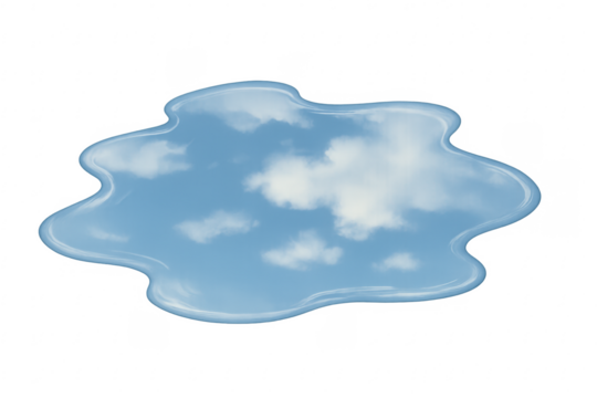 Puddle reflecting blue sky and white clouds