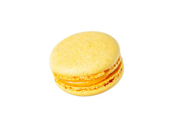 Yellow macaron isolated on a white background.