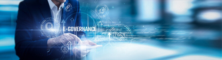 Businessman using mobile smartphone and e-governance analyzing data digital services, transparency, citizen engagement, policy monitoring, and public platforms.