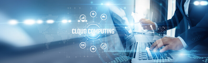 Businessman using laptop and cloud computing analyzing technological data, infrastructure-as-a-service, scalable resources, virtualization, enterprise applications, and cost optimization.