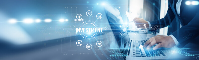 Businessman using laptop and investment analyzing technological data, stock market insights, ETF strategies, venture capital, portfolio diversification, financial technology platforms.