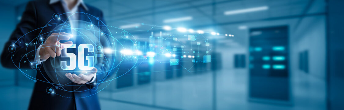 Businessman hand hold 5G network, ultra-fast connectivity, enhanced mobile broadband, IoT integration, smart devices, autonomous systems, global communications, cloud gaming, real-time analytics - Powered by Adobe