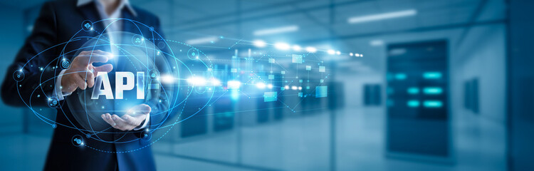 Businessman hand hold API, application integration, data exchange, cloud connectivity, developer tools, microservices architecture, system interoperability, backend frameworks, RESTful services