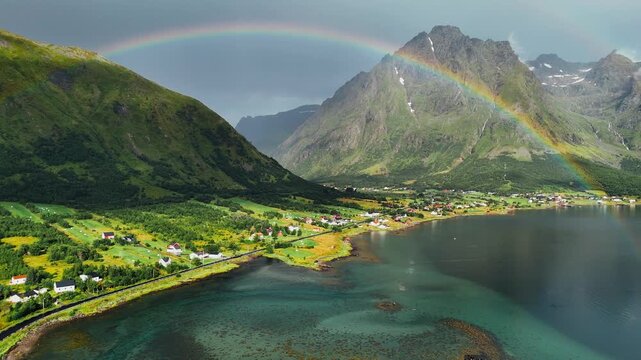 Lofoten drone video with rainbow and beautiful landscape in the background.