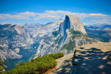 Half Dome Granite Cliffs and Forested Valley from Glacier Point in Yosemite