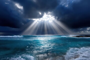 Calm ocean waves reflecting dramatic clouds and sunlight breakin