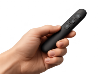 A person's hand holding a black presentation clicker isolated on transparent background.