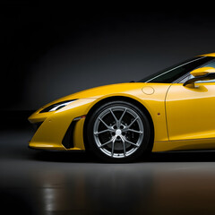 A stylish yellow coupe with glossy paint and premium alloy wheels in dark studio light