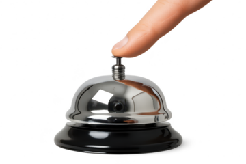 Finger pressing a polished chrome service bell isolated on transparent background