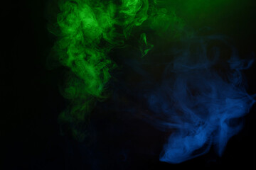 Green and pink steam on a black background.