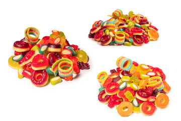 Assorted colorful gummy candies. Top view. Jelly donuts. Jelly bears. Isolated on a white background.
