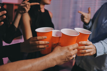 Diversity, dinner and group of people toast celebration together at party. Friends, happy and celebrate with food, wine and friendship for love, support and cheers champagne at business function