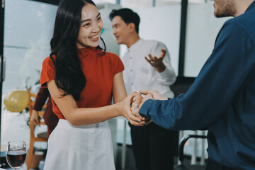 Obraz premium Diversity, dinner and group of people toast celebration together at party. Friends, happy and celebrate with food, wine and friendship for love, support and cheers champagne at business function