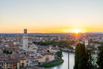 The Sun Setting Overlooking the City of Verona Italy and the Duomo di Verona Cathedral Santa Maria Matricolare