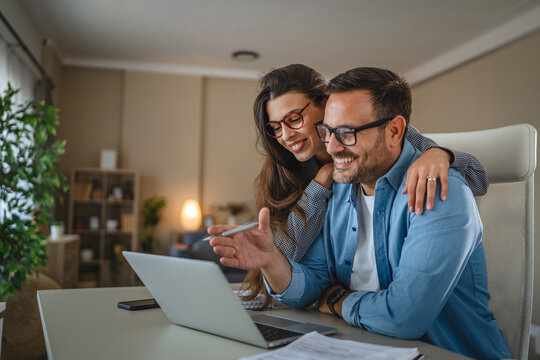 Couple planning finances and working from home together