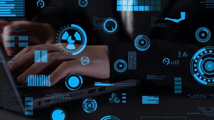 A visually engaging abstract image featuring data analysis elements in blue. The overlay shows graphs and charts while a person types on a laptop, representing technology and productivity. Xenic