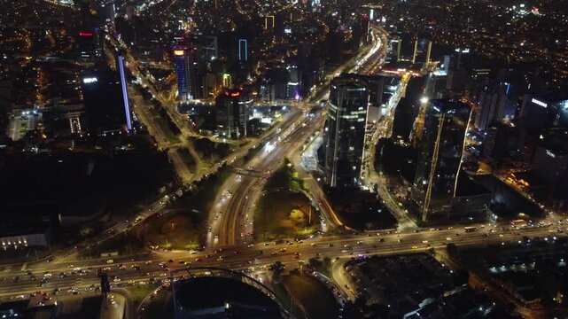 Aerial view of the javier prado avenue, a busy highway interchange with heavy traffic at night