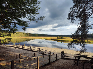 Fall landscape scenery at lake in forest. Sunset in National park, Poland 