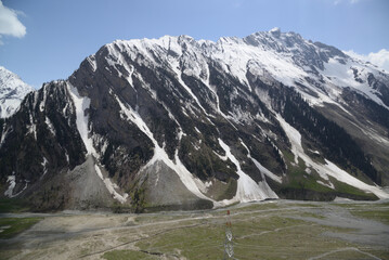 Zero Point is a viewpoint located in Kashmir, India. Located at an altitude of 4,200 meters above sea level, it is known for its beautiful scenery of vast grasslands and snow-capped Himalayan peaks.