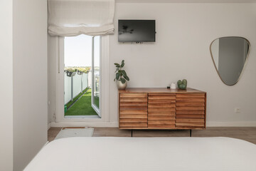 Functional space: Bedroom with a double bed, built-in wardrobe, and integrated desk