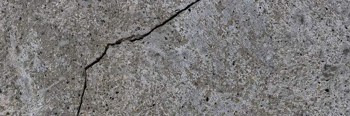 Texture of old cracked concrete wall. Rough gray concrete surface. Wide panoramic background for...