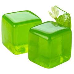 Two translucent green cubes sit beside a leaf and small white flower, suggesting freshness