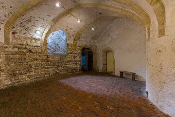 Arched vaulted ceiling and brick floor inside historic Deal Castle, Kent, England