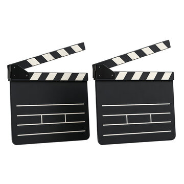 A pair of classic film clapperboards with blank slates isolated on a black background, isolated on transparent background, perfect cutout, PNG