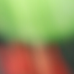 Green to Red Gradient Background. Soft Blurred Abstract Texture with Dark Atmospheric Flow