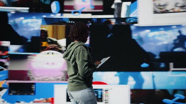 Happy young woman pleased by content on video streaming services, enjoying leisure time using tablet. Smiling teenager satisfied by entertaining VOD broadcasts on device, camera A - Powered by Adobe